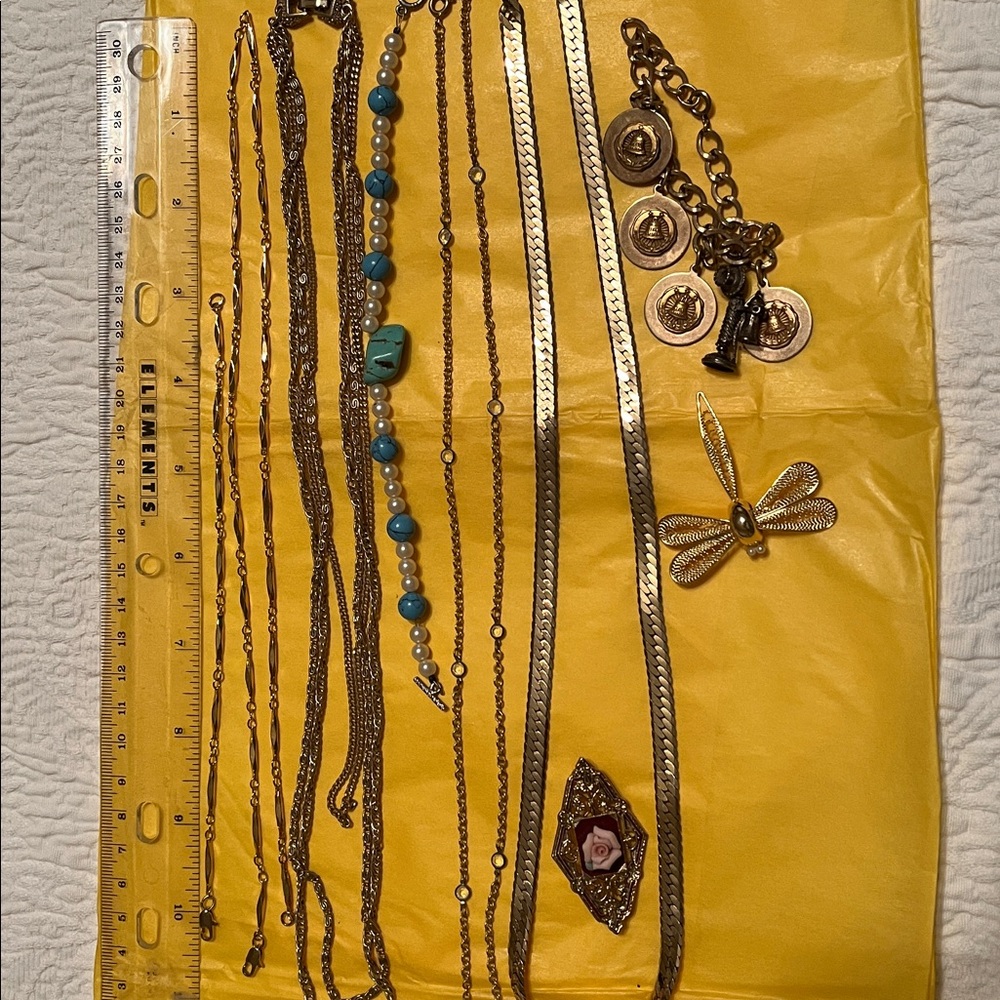 Several pieces, bracelets , pins, necklaces to add to your outfits!